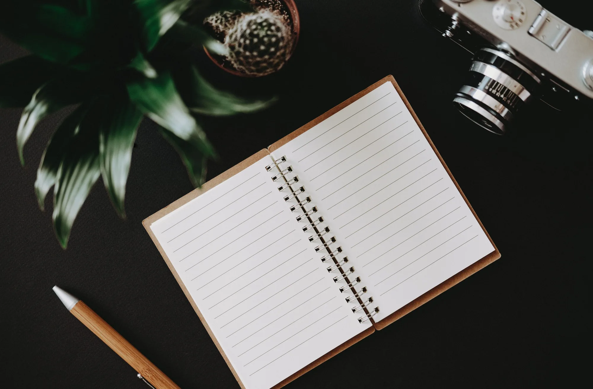 Top view flat lay work table of a journalist diary